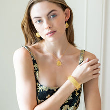 Load image into Gallery viewer, Model wears Jardin Hydrangea Gold Bangle_m donohue collection