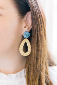 Model wears the Ava Blue Rattan earring_m donohue collection