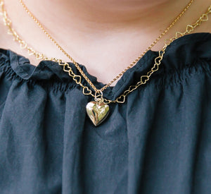 Model wears Dana Gold Heart Locket with Little Gold Hearts Necklace_m donohue collection