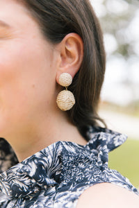 Model wears Grace Rattan Ball earring_m donohue collection
