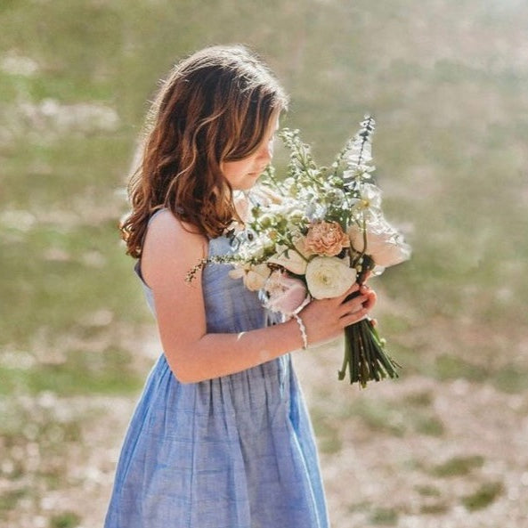 Model is wearing Little Cross Stretch Bracelet_m donohue collection