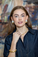 Load image into Gallery viewer, model wearing audrey mother of pearl and gold ball earrings_m donohue collection