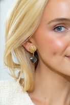 Model wearing Gold Lattice Blue Quartz Gemstone Drop Earrings_M Donohue Collection