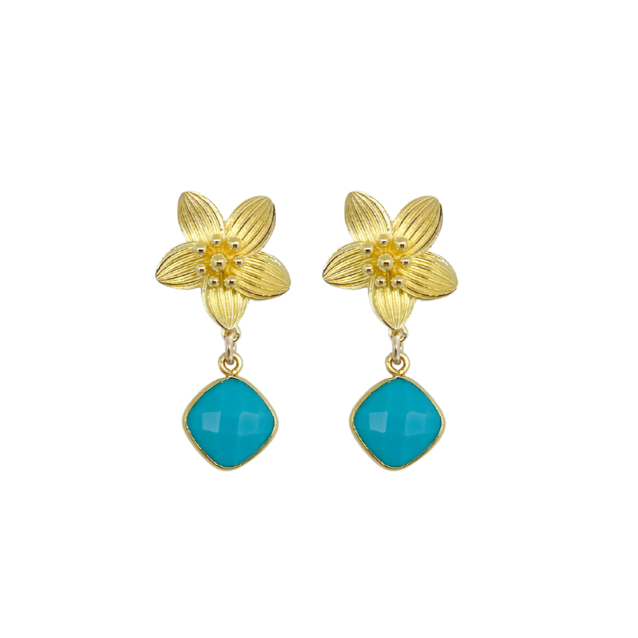 Intricate floral posts with a vibrant Turquoise drop_m donohue collection