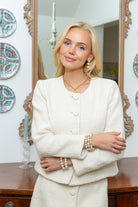 Model wearing Elizabeth Quilted Heart and Pearl Triple Drop Earrings_M Donohue Collection