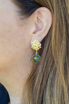 Model wearing Pearl Hydrangea Moss Peridot Drop Earrings_M Donohue Collection