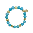 Beautiful stretch bracelet with blue turquoise color beads and gold plated copper beads_m donohue collection