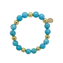 Load image into Gallery viewer, Beautiful stretch bracelet with blue turquoise color beads and gold plated copper beads_m donohue collection