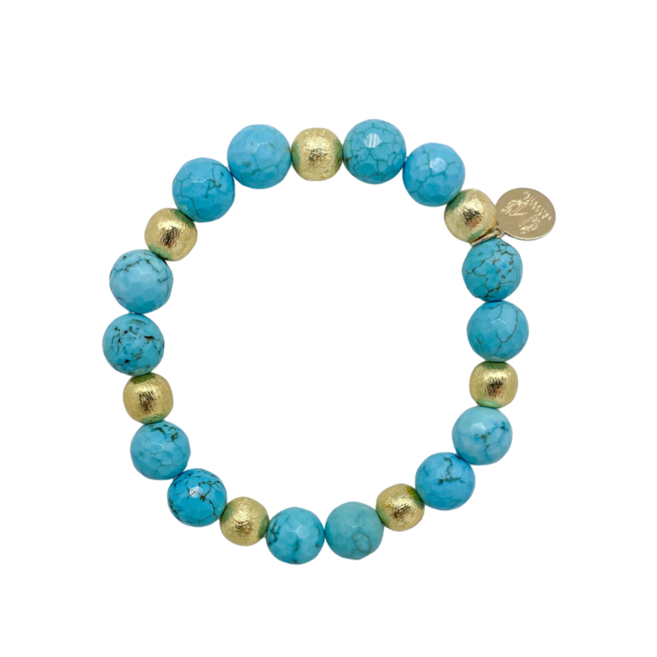 Beautiful stretch bracelet with blue turquoise color beads and gold plated copper beads_m donohue collection