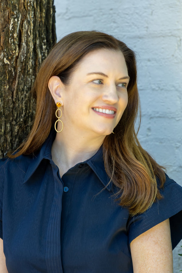 Model wearing Orange Citrine Double French Twist Earrings_M Donohue Collection