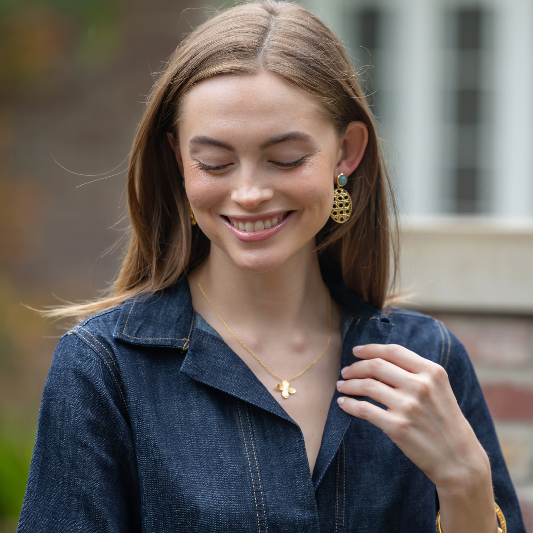 Model is wearing Remy Wicker Gold Oval & Aquamarine Earrings_m donohue collection