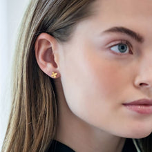Load image into Gallery viewer, Model is wearing Tiny Bloom Gold Stud Earrings_m donohue collection