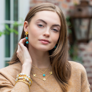 Model is wearing Olivia Cotton Pearl & Multi Gold Bracelet_m donohue collection