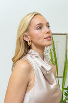 Model wearing Elizabeth Amethyst Heart Drop Earrings_M Donohue Collection