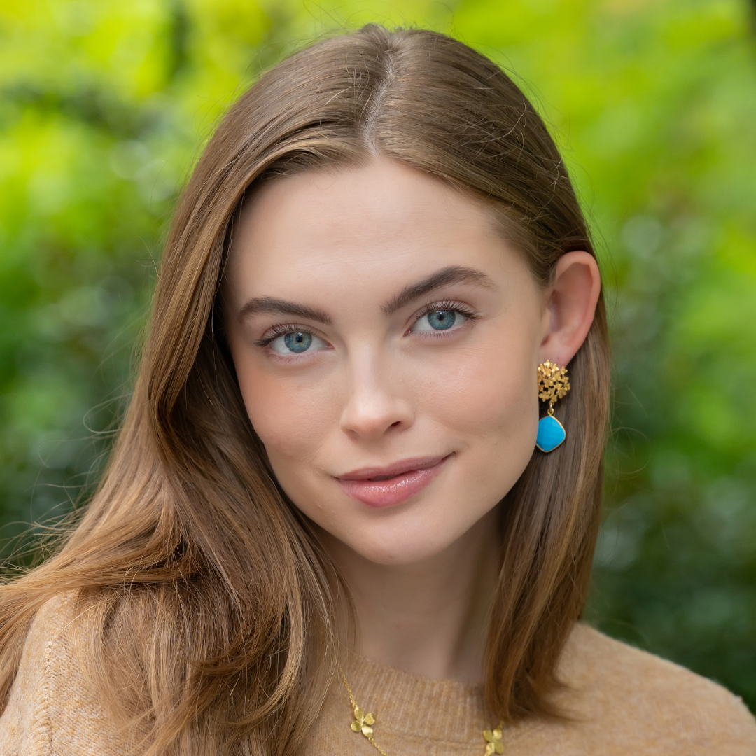 Model wears Jardin Hydrangea Turquoise Drop earrings_m donohue collection