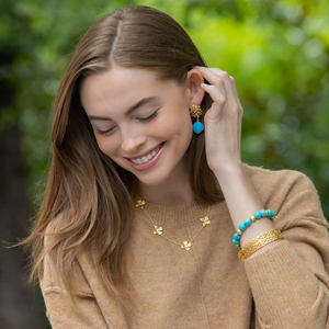 Model wears Jardin Hydrangea Turquoise Drop earrings_m donohue collection