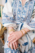 Load image into Gallery viewer, Model is wearing Maison Treillage Gold Bangle with the Versailles Treillage and Jardin Gold Bangles_m donohue collection