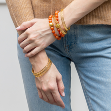 Load image into Gallery viewer, Model wears Lauren Burnt Orange bracelet_m donohue collection