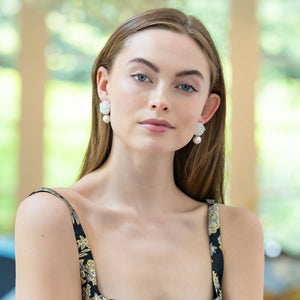 Model is wearing Liz Cotton Pearl White Earrings_m donohue collection