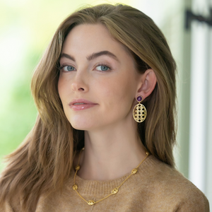 Model wears Remy Wicker Gold Oval & Amethyst Gem Earrings_m donohue collection