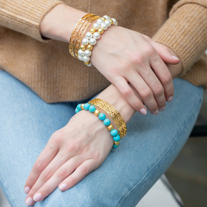 Model wears lauren turquoise multi gold bracelet_m donohue collection