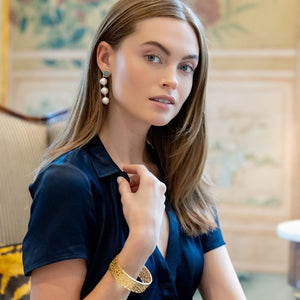 Model is wearing Triomphe Aquamarine and Triple Cotton Pearl Earrings_m donohue collection