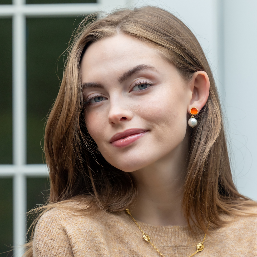 Model wears Triomphe Carnelian & Single Cotton Pearl Earrings_m donohue collection