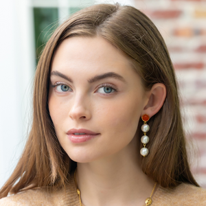 Model wears Triomphe Carnelian & Triple Cotton Pearl Earrings_m donohue collection