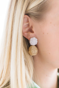 Model is wearing Liz White Rattan Ball Earrings_m donohue collection