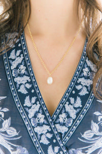 Model wears Dana White Pearl drop necklace_m donohue collection