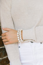 Load image into Gallery viewer, Model is wearing Olivia Cotton Pearl Bracelet_m donohue collection
