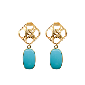 Gold wicker posts paired perfectly with a vibrant Turquoise drop_m donohue collection