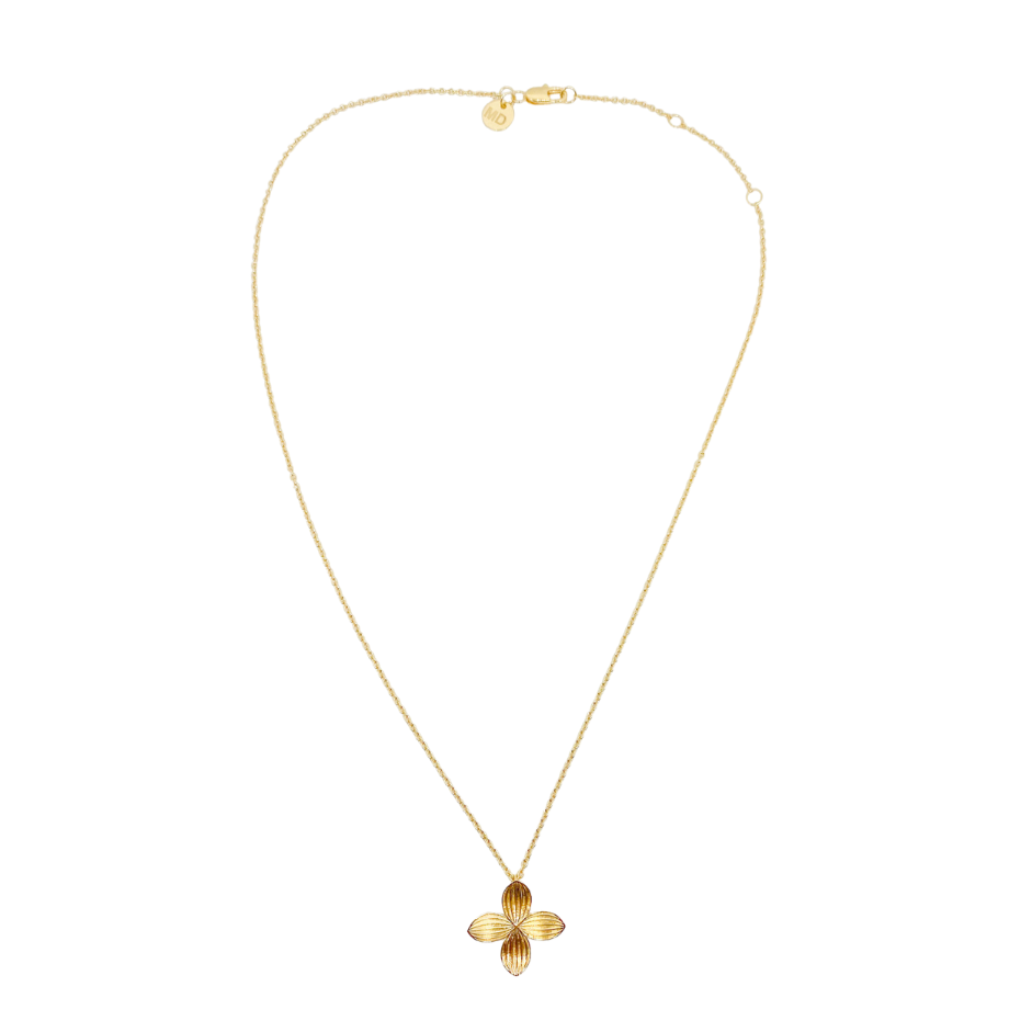 Single antique inspired gold floral pendant on delicate adjustable chain_m donohue collection