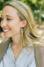 Load image into Gallery viewer, Model is wearing Molly Silver Flower Earrings_m donohue collection