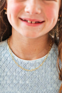 Model is wearing Little Hearts Necklace Gold_m donohue collection