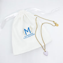 Load image into Gallery viewer, Little Enamel Lavender Heart Necklace displayed with branded linen pouch_m donohue collection