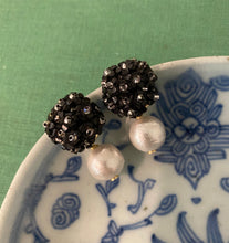 Load image into Gallery viewer, Liz Cotton Pearl Onyx Earrings displayed on blue porcelain_m donohue collection