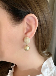 Model wears Grace Rattan Gold Ball earring_m donohue collection