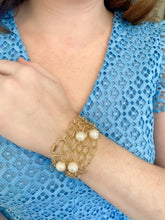 Load image into Gallery viewer, Model wears Annabelle Gold &amp; Pearl necklace as a bracelet_m donohue collection