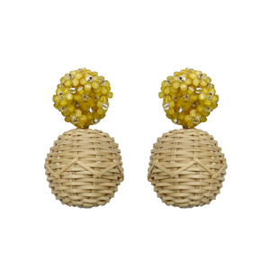 Delicate yellow flower cluster posts with woven rattan ball_m donohue collection