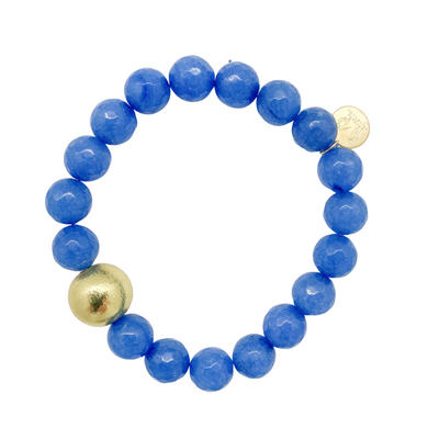 Beautiful stretch bracelet with blue jade beads and single gold plated copper bead_m donohue collection