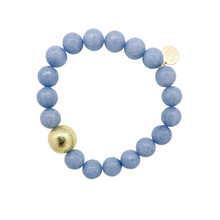 Load image into Gallery viewer, Stretch bracelet with sky blue gemstones and gold plated copper bead_m donohue collection