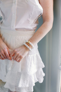 Model is wearing Olivia Cotton Pearl & Gold Bracelet_m donohue collection