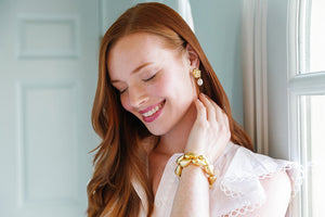 Model is wearing Jardin Hydrangea Pearl Single Earrings_m donohue collection