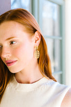 Load image into Gallery viewer, Model is wearing Remy Wicker Gold Oval Link Earrings_m donohue collection