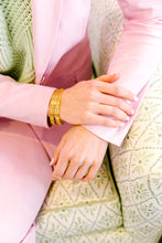 Load image into Gallery viewer, Model is wearing Maison Treillage Gold Bangle_m donohue collection