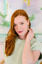 Model is wearing Triomphe Aquamarine and Triple Cotton Pearl Earrings_m donohue collection