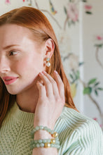 Load image into Gallery viewer, Model is wearing Triomphe Aquamarine and Single Cotton Pearl Earrings_m donohue collection