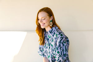 Model wears the Ava Green Rattan earring_m donohue collection