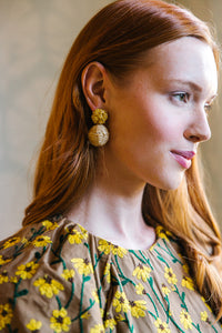 Model is wearing Liz Yellow Rattan Ball Earrings_m donohue collection